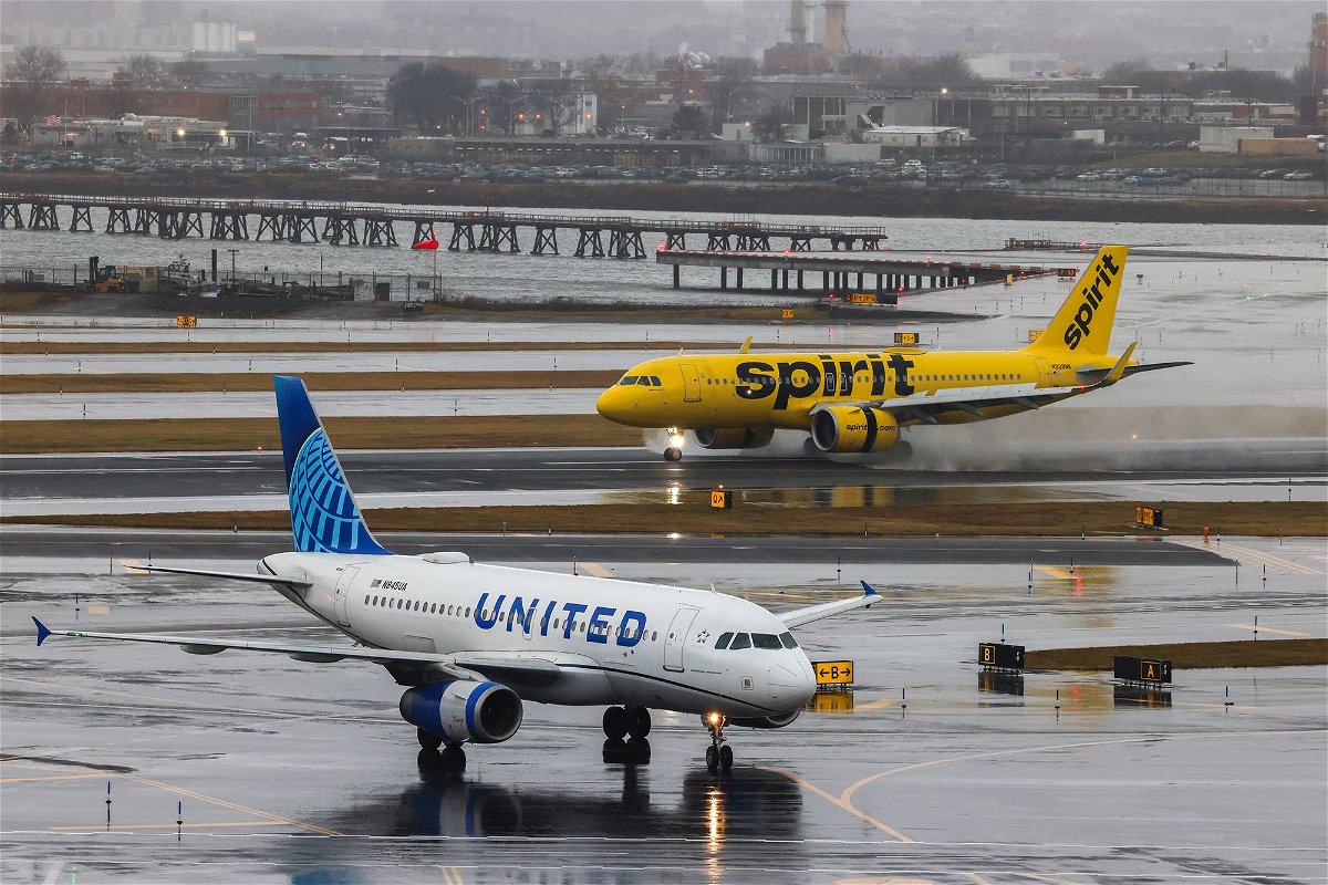 <i>Charly Triballeau/AFP/Getty Images via CNN Newsource</i><br/>JetBlue Airways is pulling out of its deal to purchase Spirit Airlines. United and Spirit airlines aircrafts are pictured here at La Guardia Airport on January 9.