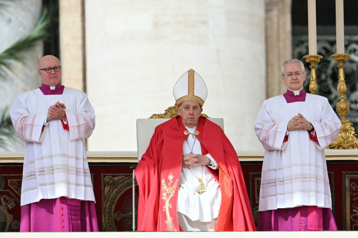 <i>Gregorio Borgia/AP via CNN Newsource</i><br />Crowds gather in St. Peter's Square during the Palm Sunday mass.