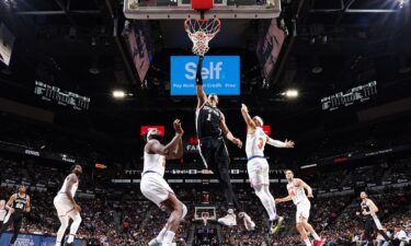 Victor Wembanyama drives to the basket during the game against the New York Knicks on March 29