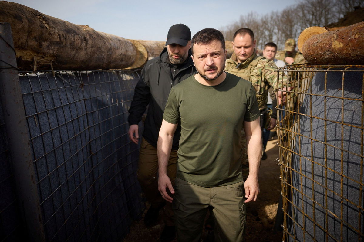 <i>Ukrainian Presidential Press Service/Handout/Reuters via CNN Newsource</i><br/>Ukraine's President Volodymyr Zelensky inspects new fortifications for Ukrainian servicemen near the Russian border in the Kharkiv region on Tuesday.