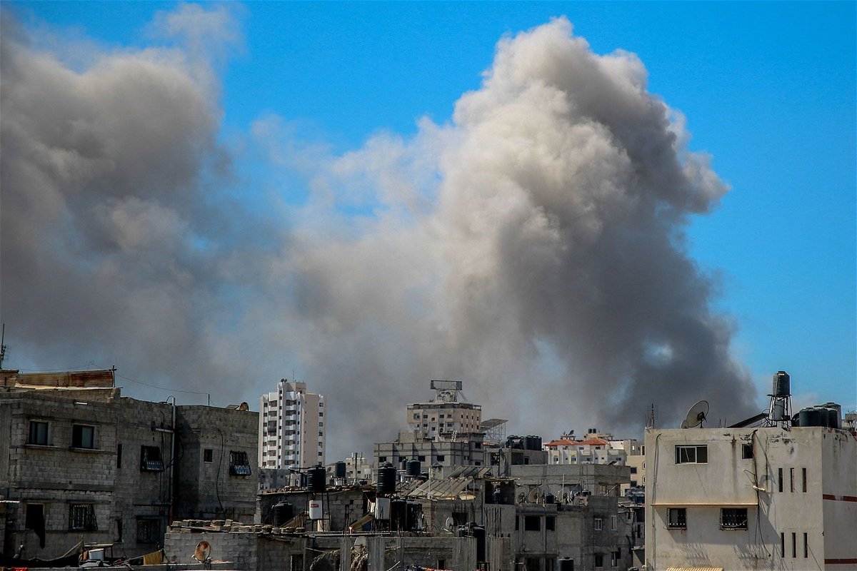 <i>AFP/Getty Images/File via CNN Newsource</i><br/>Smoke billows after Israeli bombardment near Al-Shifa hospital in Gaza City on March 23.