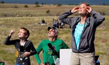 People watch the 2017 total solar eclipse in Guernsey