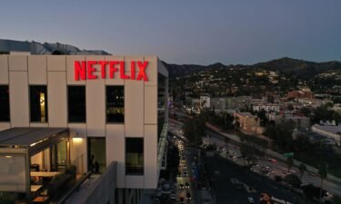 The Netflix logo is seen on top of their office building in Hollywood
