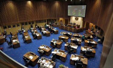 Arizona state senators convene on Senate floor at the Capitol on April 10