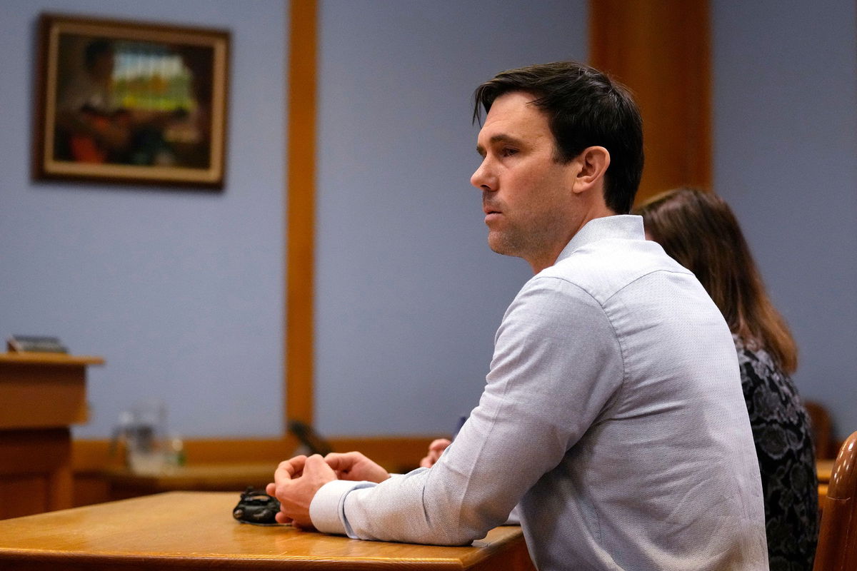 <i>Charles Krupa/AP via CNN Newsource</i><br />James Parker listens to the decision in a parole board hearing in Concord