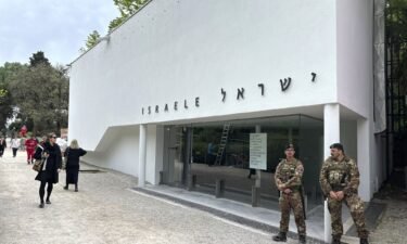 Italian soldiers patrol the Israeli national pavilion at the Biennale contemporary art fair in Venice