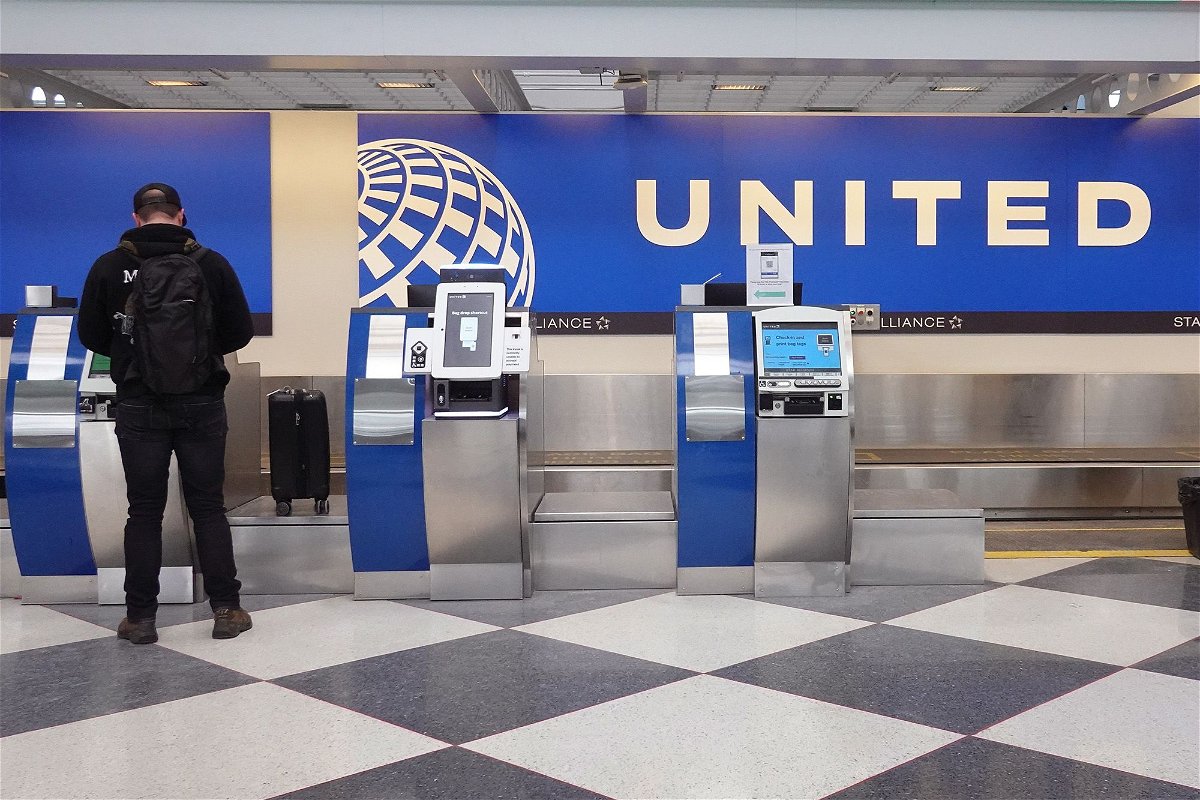 <i>Scott Olson/Getty Images via CNN Newsource</i><br/>Passengers check in for United Airlines flights at O'Hare International Airport in January. The airline said the grounding of its fleet of Boeing 737 Max 9 jets due to the blowout of a door plug on an Alaska Airlines flight cost it $200 million.