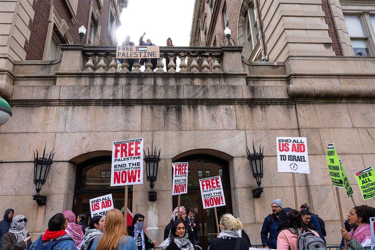	Pro-Palestinian protesters hold a small rally outside of Columbia University on April 24, in New York City.