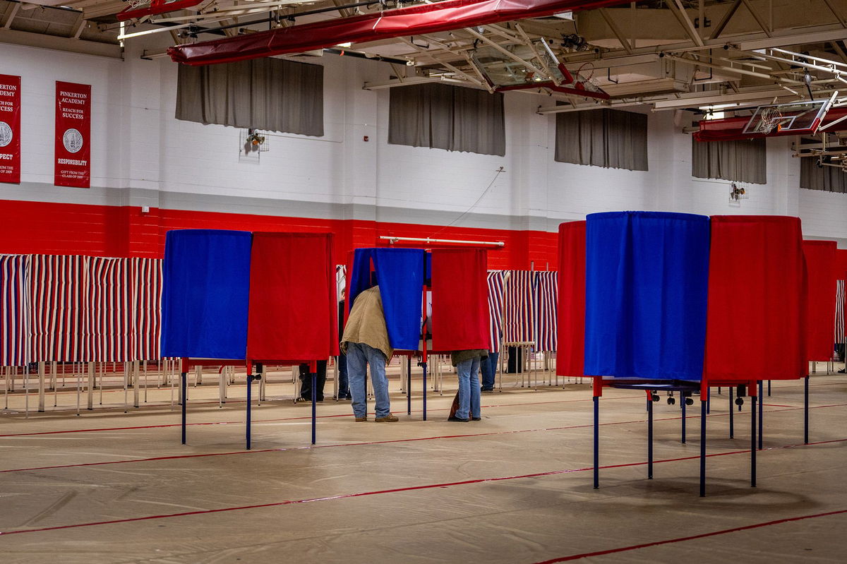 <i>Brandon Bell/Getty Images via CNN Newsource</i><br/>Voters cast their ballots in the New Hampshire Primary at Pinkerton Academy on January 23 in Derry