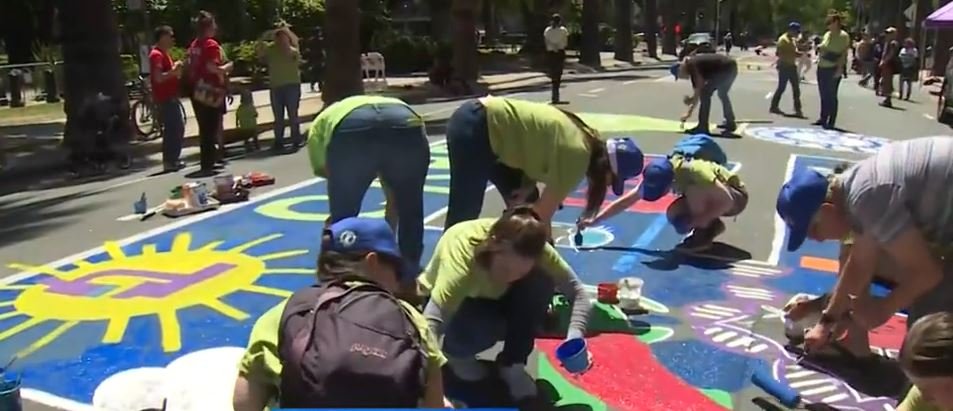 <i>KOVR via CNN Newsource</i><br/>Labor groups painted the street in unpermitted protest at the California State Capitol on May Day.
