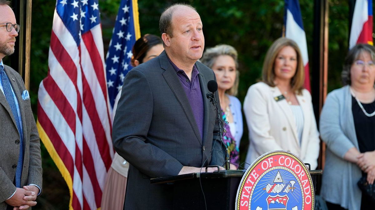 Colorado Gov. Jared Polis is seen here on May 24 in downtown Denver. The Colorado legislature sent a bill to the governor that seeks to limit children’s social media use.
