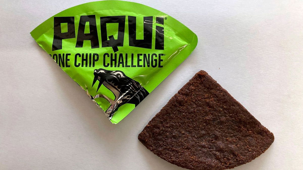 A Paqui One Chip Challenge chip is displayed in Boston, on Sept. 8, 2023.
