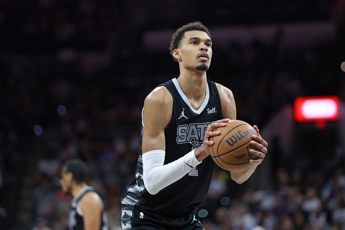 <i>Tim Heitman/NBAE/Getty Images via CNN Newsource</i><br/>Victor Wembanyama #1 of the San Antonio Spurs shoots a free throw during the game against the Philadelphia 76ers on April 7 at the Frost Bank Center in San Antonio