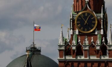 The Russian flag flies on the dome of the Kremlin Senate building. An American soldier arrested in Russia on suspicion of theft will be detained for two months.