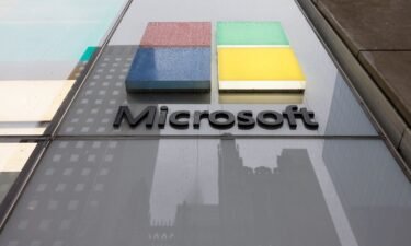 The Microsoft logo is seen at an Experience Center on Fifth Avenue on April 3 in New York City. Microsoft said it is pouring $3.3 billion into building a data hub in Wisconsin.