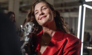 Drew Barrymore holds dog influencer Tika the Iggy during an interview in 2022. Barrymore adores animals. She said she wept the most writing her memoir “Wildflower” when she shared a story about her beloved dog