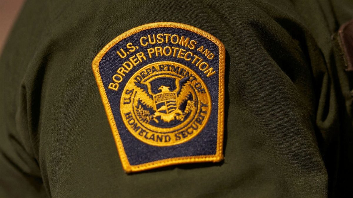 <i>ALLISON DINNER/AFP/AFP via Getty Images via CNN Newsource</i><br />A US Customs and Border Protection patch on the arm of an agent in the Jacumba mountains on October 6