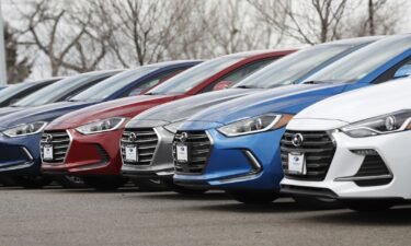 A line of unsold 2018 Elantra sedans sits outside a Hyundai dealership in Littleton