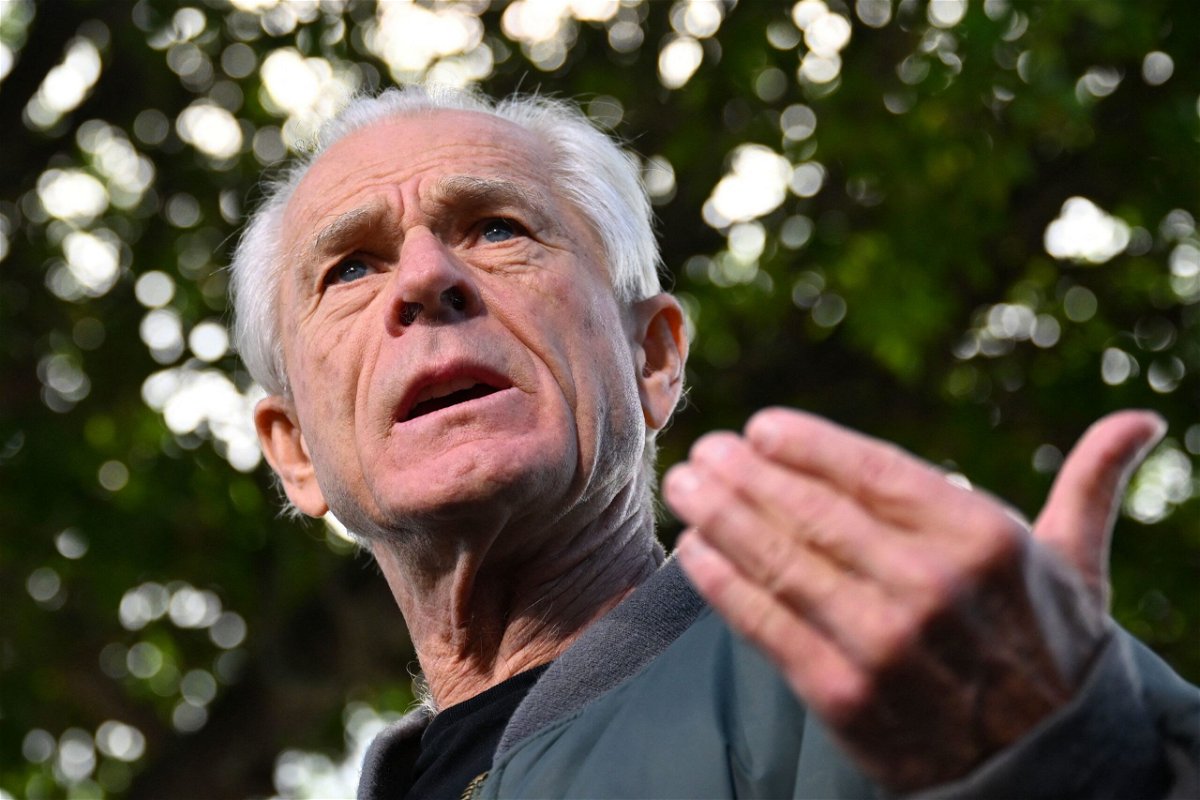 <i>Chandan Khanna/AFP via Getty Images via CNN Newsource</i><br/>Peter Navarro speaks to the press at the Country Mall Plaza before reporting to the Federal Correctional Institution