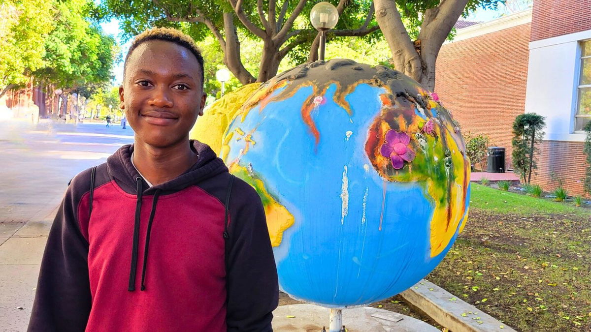 <i>Courtesy Christopher Ategeka via CNN Newsource</i><br />Helms Ategeka with some of his many college acceptance letters. He graduates from high school next month in Oakland