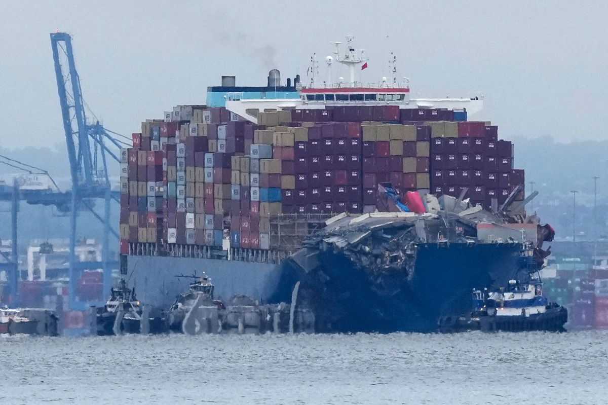 <i>Leah Millis/Reuters via CNN Newsource</i><br/>Explosives are detonated to free the container ship Dali after it was trapped following its collision with the Francis Scott Key Bridge.