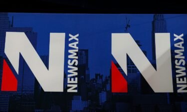 A detail view of the Newsmax logo during the National Rifle Association Annual Meeting