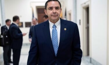 Rep. Henry Cuellar walks from his office to the House chamber to vote on Capitol Hill