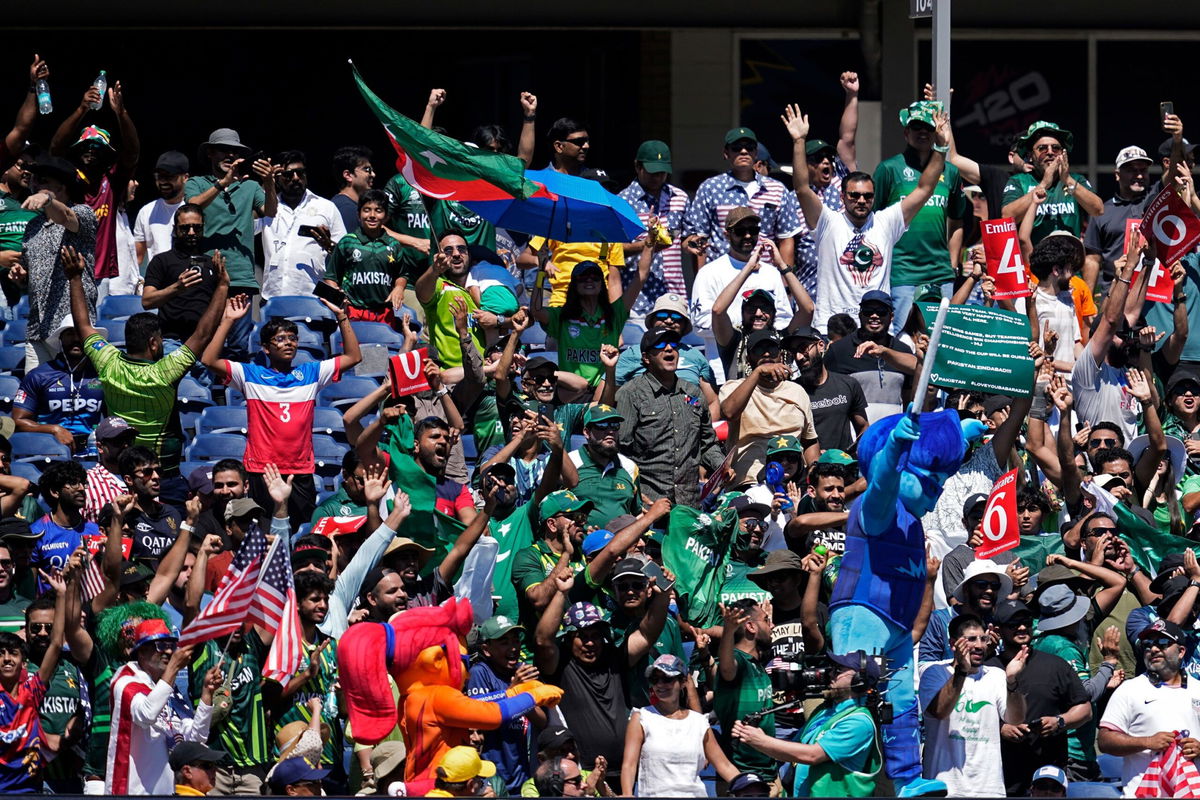 Fans react after a boundary hit by Pakistan batsman during the ICC Men's T20 World Cup cricket match between United States and Pakistan at the Grand Prairie Stadium in Grand Prairie, Texas, on June 6.