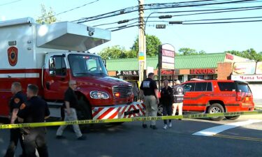 First responders on the scene after a minivan drove through a Long Island nail salon in Deer Park