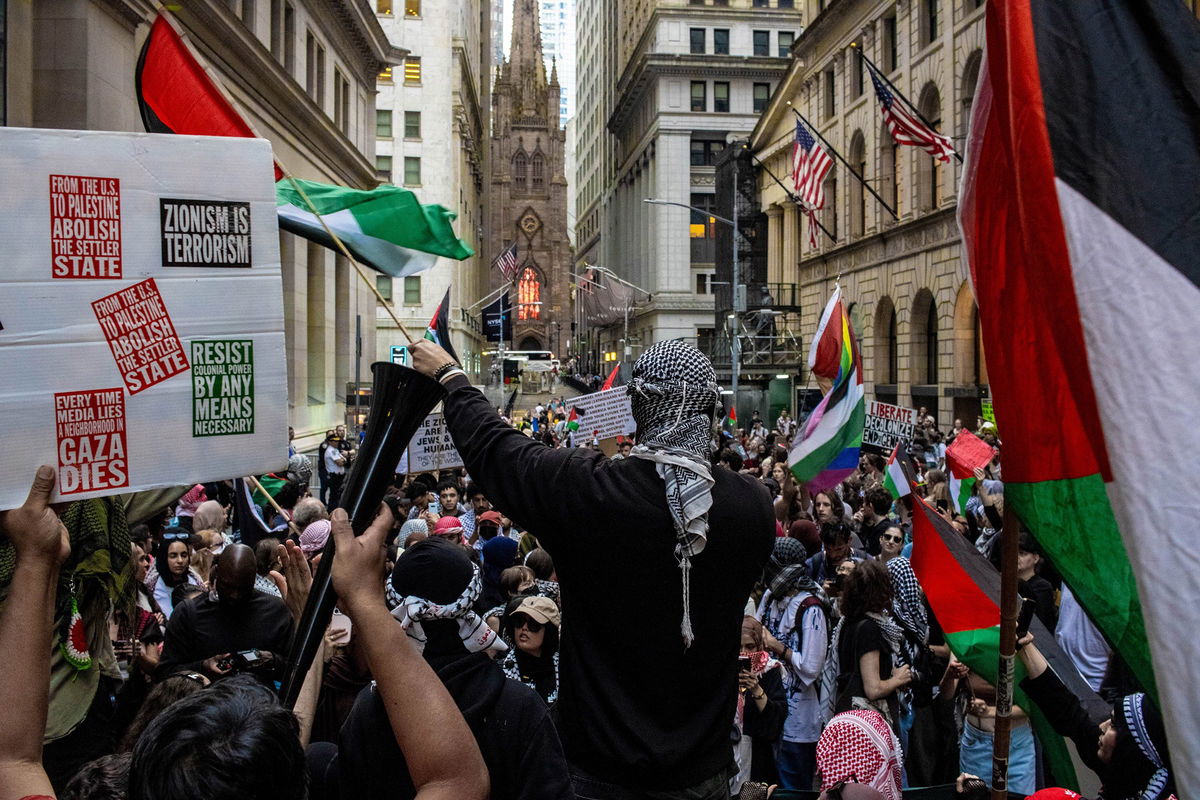 <i>Jonathan Fernandes/Sipa USA via CNN Newsource</i><br/>Demonstrators hold a rally in support of Palestine outside the Nova Music Festival Exhibition in New York City on June 10.