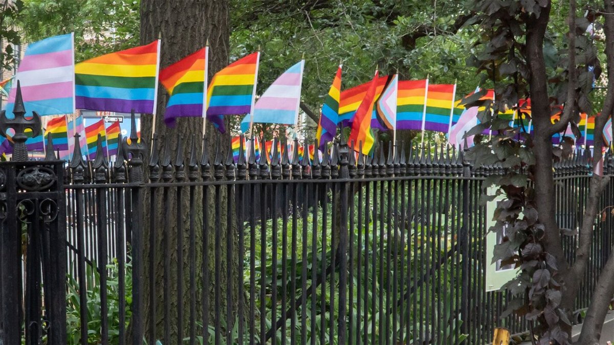 <i>John Senter/UCG/Getty Images/File via CNN Newsource</i><br/>The flag installation seen in June 2023 on the fence at Christopher Park is part of the Stonewall National Monument in New York City.