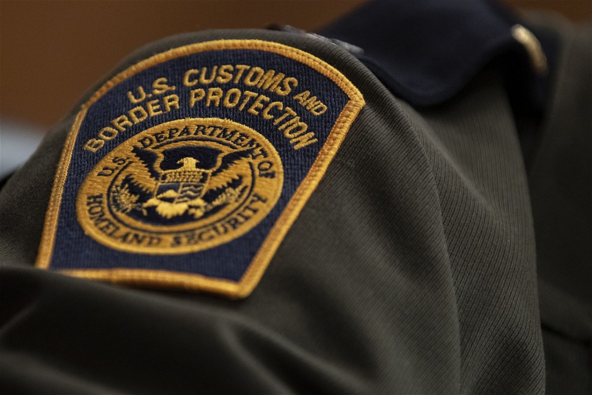 <i>Alex Edelman/Getty Images via CNN Newsource</i><br/>A US Customs and Border Protection patch is seen on an officer's uniform.