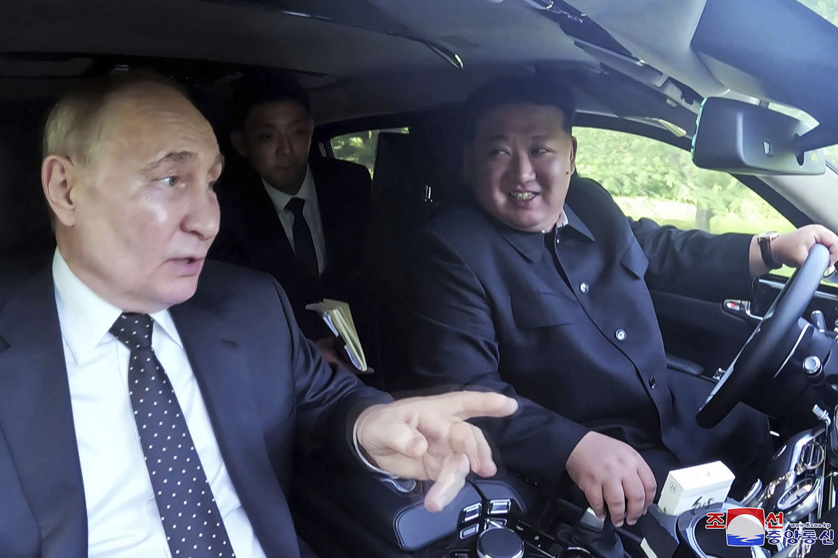 Putin and Kim seen laughing in Russian-made limousine after inking ...