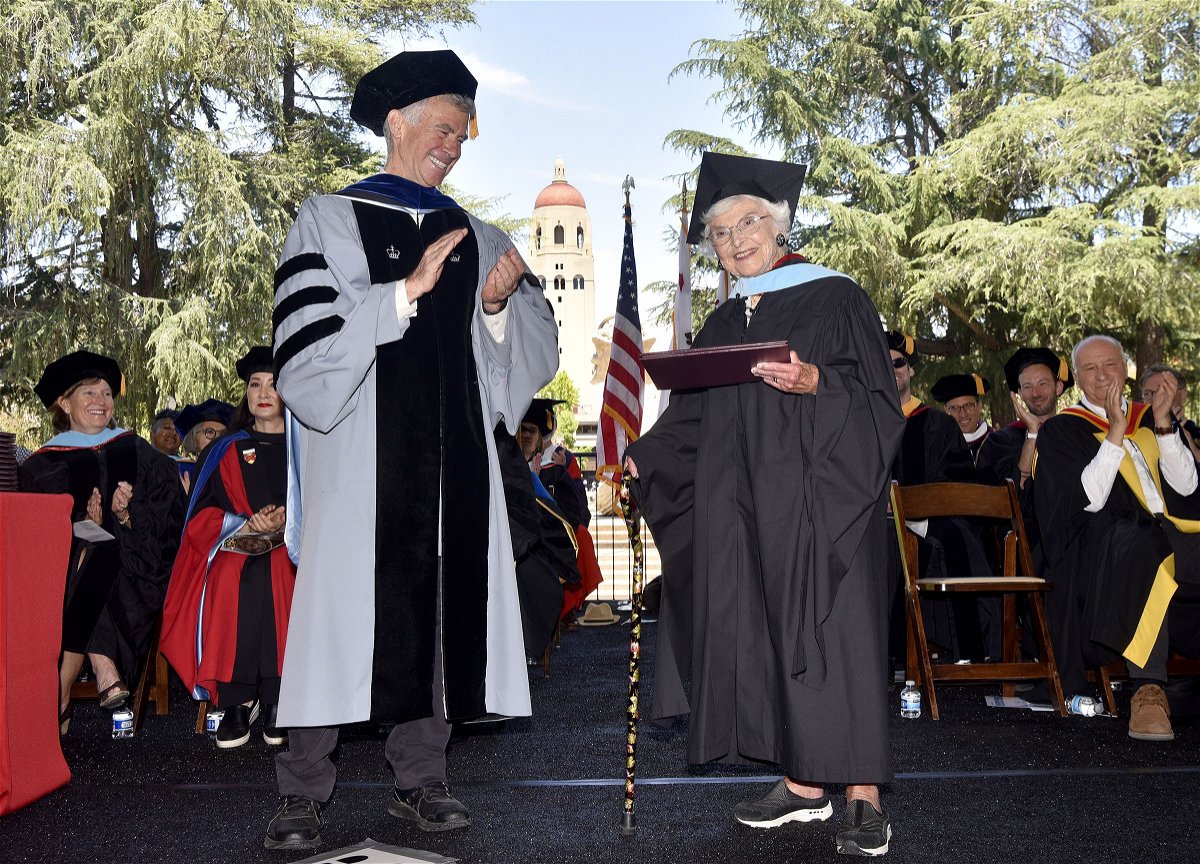 <i>Charles Russo for Stanford University via CNN Newsource</i><br/>Virginia Hislop accepts her diploma for her master of arts in education at Stanford University's 2024 Graduate School of Education commencement ceremony from Dean Dan Schwartz.