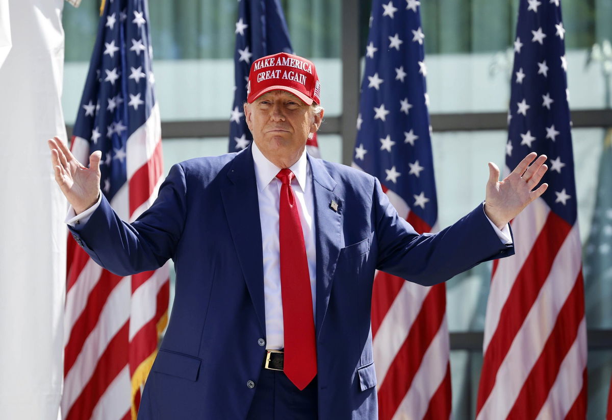 <i>Jeffrey Phelps/AP via CNN Newsource</i><br/>Former President Donald Trump enters at a campaign event on June 18