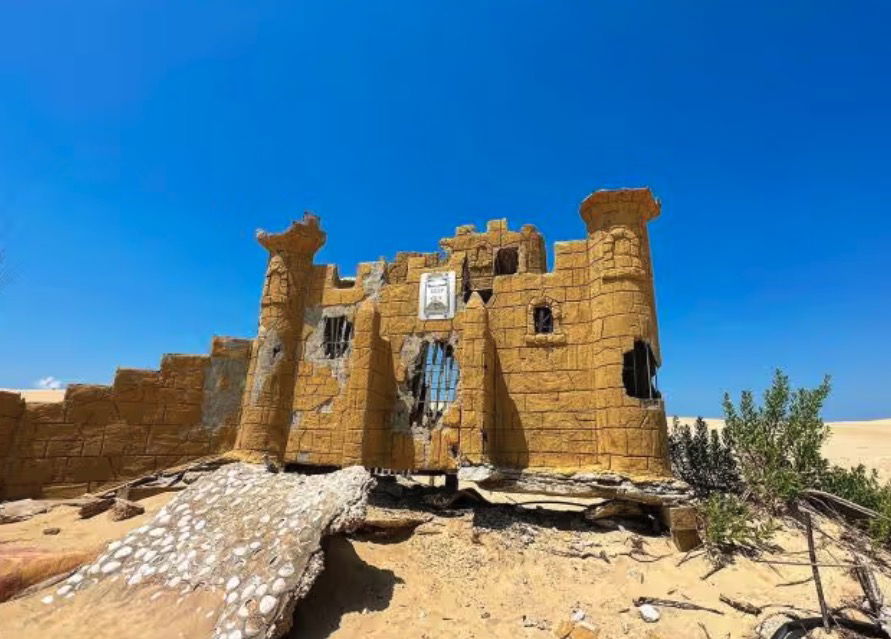 <i>WRAL via CNN Newsource</i><br/>The hidden castle is just one piece of an entire course of giant mini-golf structures that stood atop the dune in the 1970s.