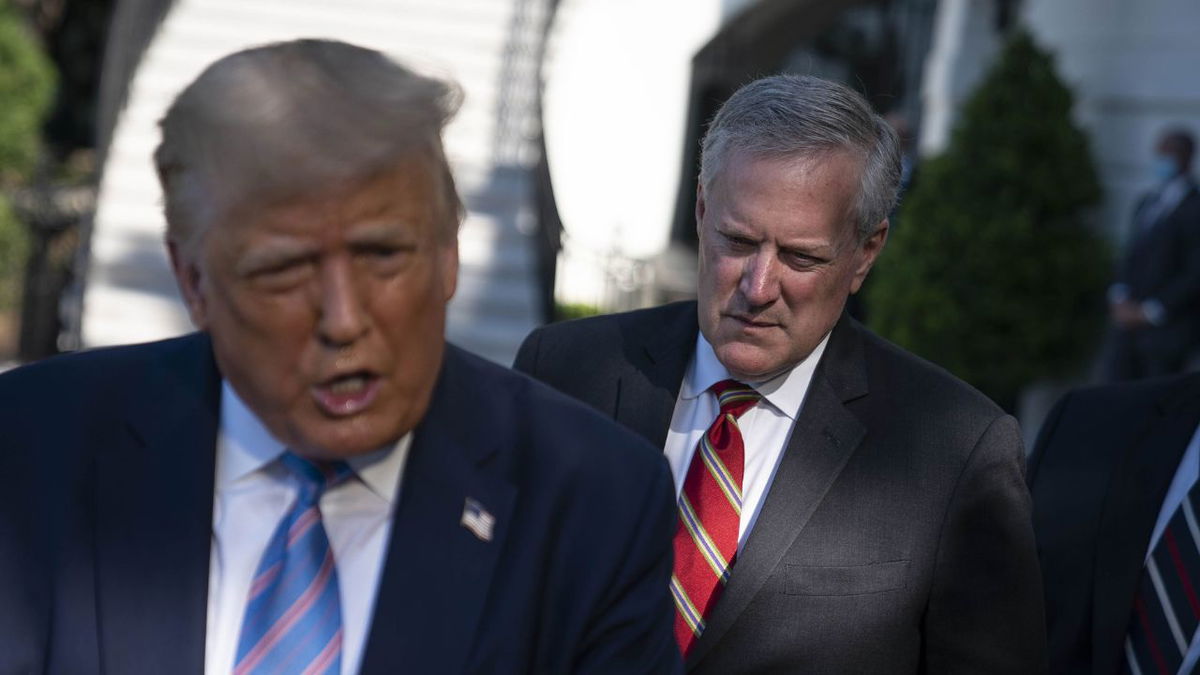 Mark Meadows, White House chief of staff, listens as U.S. President Donald Trump, left, speaks to members of the media on July 29, 2020.
