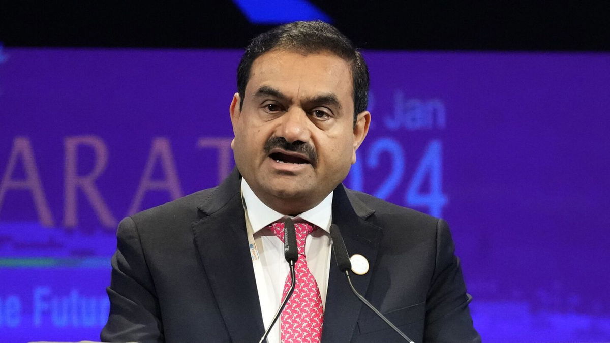 <i>Ajit Solanki/AP via CNN Newsource</i><br/>Gautam Adani addresses the Vibrant Gujarat Global Summit