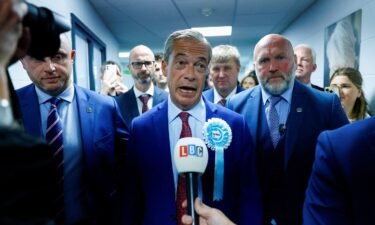 Britain's Reform UK Party Leader Nigel Farage speaks to the media after winning his first seat in parliament during the UK election in Clacton-on-Sea