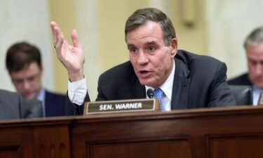 Sen. Mark Warner delivers remarks during a Rules Committee hearing at the Russell Senate Office Building in November 2023 in Washington