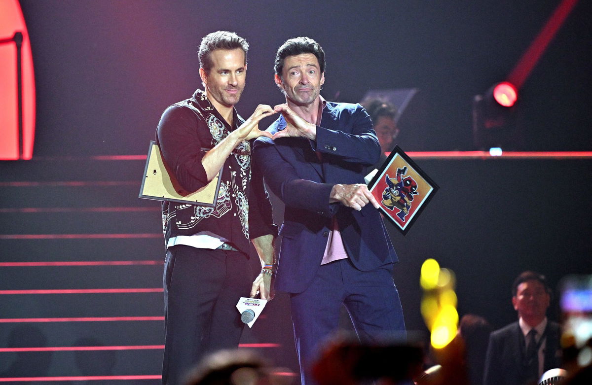 <i>Jung Yeon-je/AFP/Getty Images via CNN Newsource</i><br/>Hugh Jackman (R) and Ryan Reynolds (L) pose during a red carpet event to promote their new film 'Deadpool & Wolverine' in Seoul on July 4