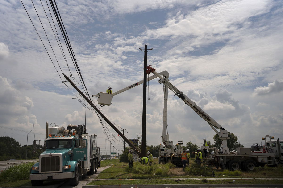 <i>Daniel Becerril/Reuters via CNN Newsource</i><br/>Cars and buildings are partially submerged in floodwaters in the aftermath of Hurricane Beryl in Houston on July 8