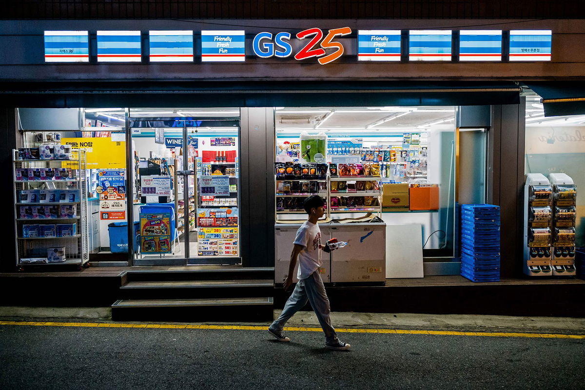 <i>Heo Ran/Reuters via CNN Newsource</i><br/>An office worker eats his lunch at a convenience store in Seoul