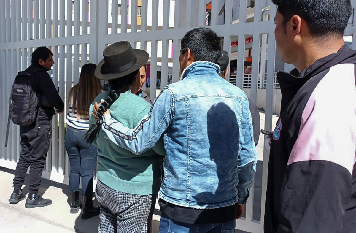 <i>Cinthya Carbajal/AFP/Getty Images via CNN Newsource</i><br/>Relatives of the passengers wait for news about their loved ones outside the Mariscal Hospital in Ayacucho