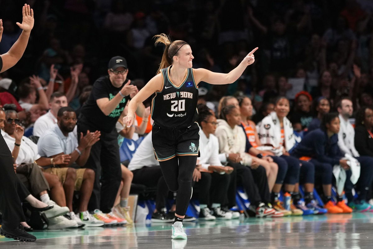 <i>Evan Yu/NBAE/Getty Images via CNN Newsource</i><br/>Sabrina Ionescu celebrates against the Connecticut Sun at Barclays Center.