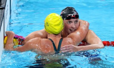 Katie Ledecky embraces Australia's Titmus after the race.