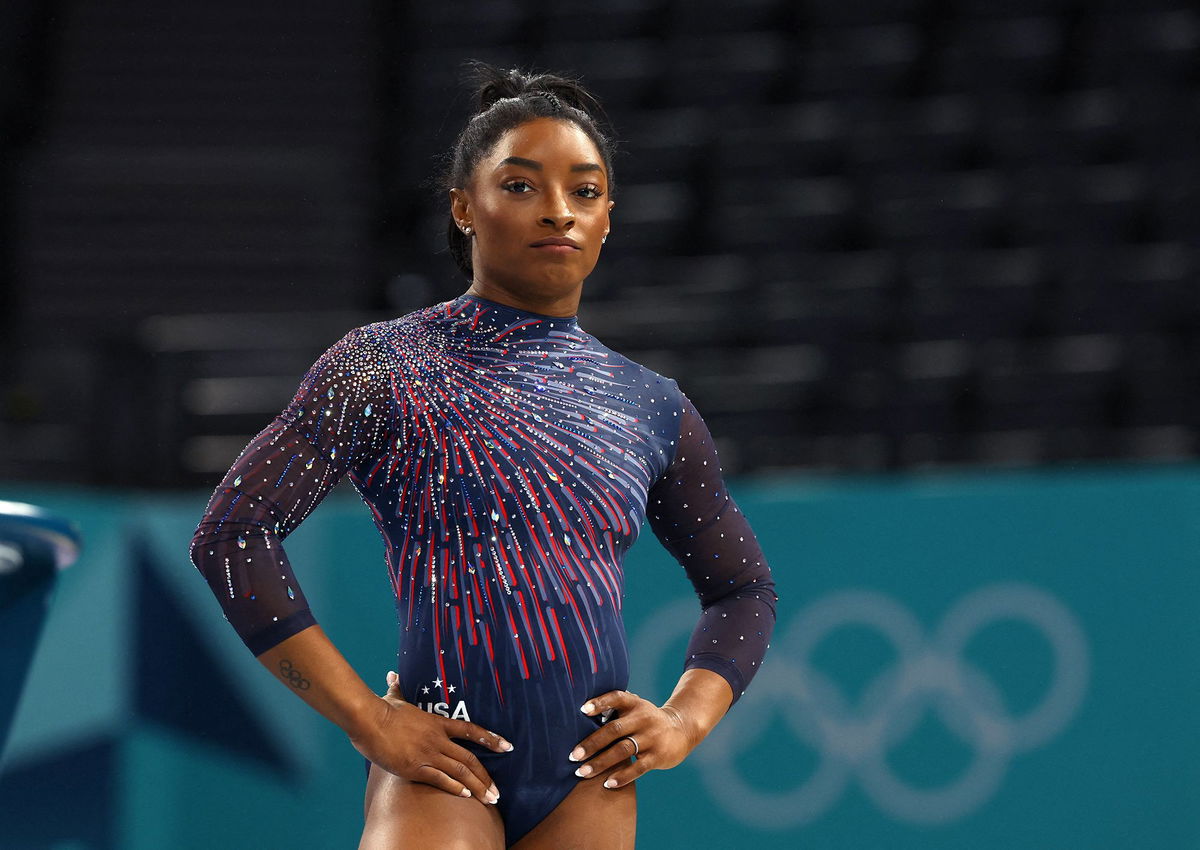 <i>Jamie Squire/Getty Images via CNN Newsource</i><br/>Biles competes on balance beam at the Tokyo Olympics.