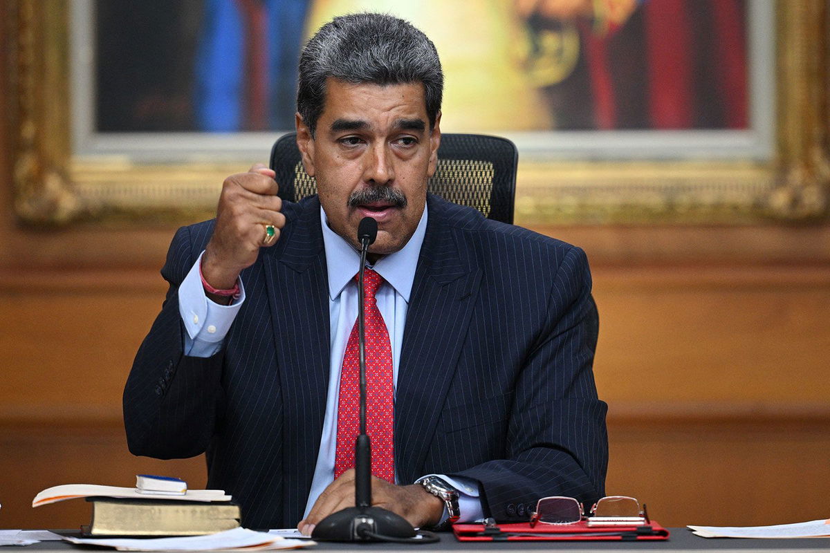 <i>Federico Parra/AFP/Getty Images via CNN Newsource</i><br />Venezuelan President Nicolas Maduro gestures talks about the election during a press conference with the international media in Caracas on July 31