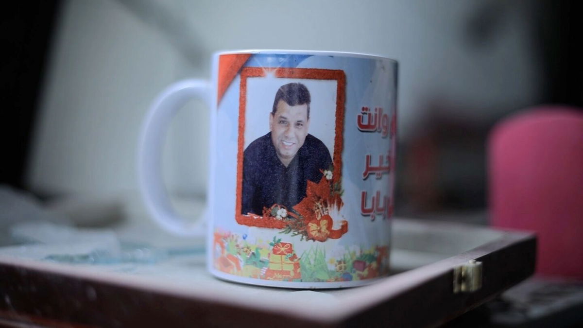 <i>CNN via CNN Newsource</i><br/>A mug with a image of Akram Abu Tabaq