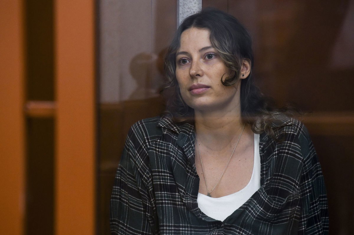 <i>AP via CNN Newsource</i><br />Ksenia Karelina sits in a glass cage in a court in Yekaterinburg